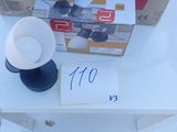 a box of boxes and a spool of thread on a table