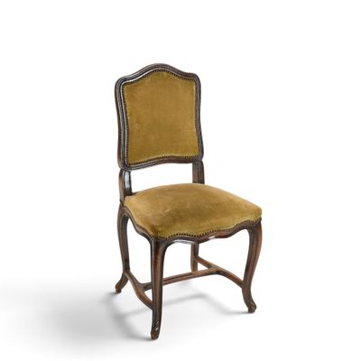an image of a wooden chair with a yellow upholstered seat