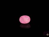 an image of a pink moon in the dark sky