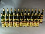 a lot of bottles of wine sitting on a table