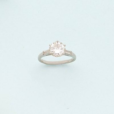 a picture of a diamond ring on a white background