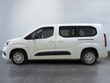 a picture of a white van parked in a garage