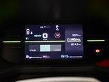 the dashboard of a car with a digital display on it