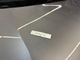 a sticker on the hood of a car that says outlasv