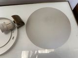 a picture of a bathroom with a toilet and a sink