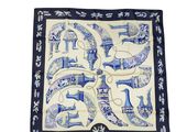 une photo d'une écharpe bleue et blanche ornée d'un motif