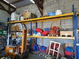 many different types of hoses on the shelves in the garage