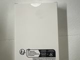 a white box with a black and white logo on it