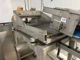 an image of a conveyor belt in a commercial kitchen