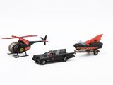 two toy cars and a helicopter on a white surface