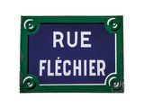 a blue sign that says rue flecher on it