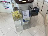 a counter with a lot of items on it in a store