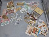 a suitcase full of money and coins on the floor