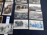 some old black and white photos of a bunch of buildings
