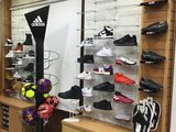 a lot of shoes on display in a shoe store
