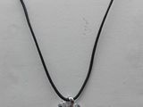 a close up of a necklace on a mannequin display