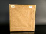 a brown box with a label on it sitting on a table