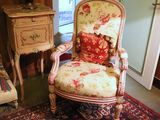 a chair that is sitting in the middle of a room