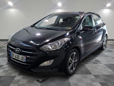 a picture of a black car parked in a garage