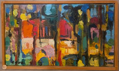 un tableau sur le mur d'une pièce avec un tableau sur le mur