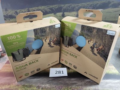 two boxes of aqua backpacks are on display at a store
