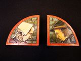deux œuvres d'art posées sur une table noire