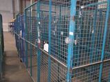 many cages in the building that are being used for animals