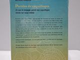 the back cover of a book on a table with a white background