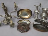 a lot of silver items that are on a table