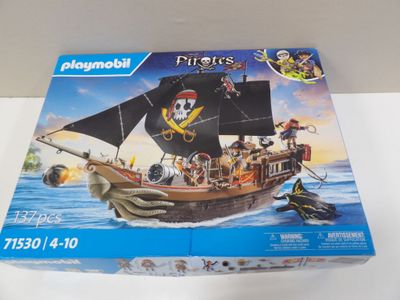 a box of playmobil pirates with a pirate ship on it