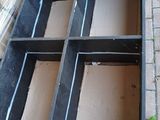 a window that has been built into the side of a building