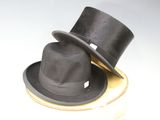 two hats sitting on top of each other on a table
