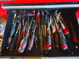many tools in a tool box that is open