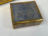 a small box that is sitting on a table next to a box