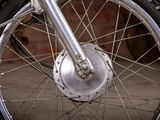a close up of a motorcycle wheel with a tire