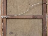 an old picture of a wooden frame with a string attached to it