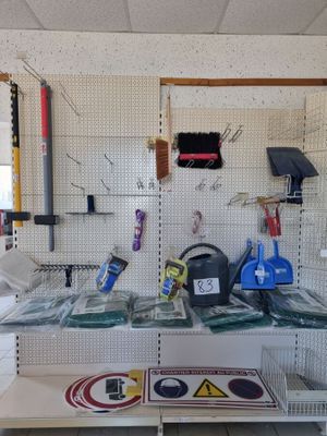 a shelf with various items on it in a store