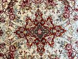 an image of a large oriental rug with red and white flowers