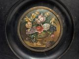 a picture of a picture of a vase of flowers on a plate