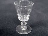 a glass that is sitting on a table