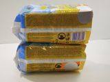 three packages of baby wipes stacked on top of each other