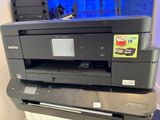 a printer that is sitting on top of a printer