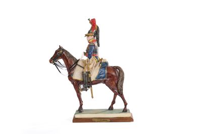 figurine représentant un soldat à cheval sur fond blanc