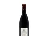 a close up of a bottle of wine on a white background