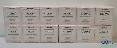 six boxes of lubrac are stacked on top of each other