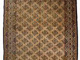 tapis persan ancien à motif floral sur fond beige