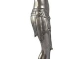 statue of a woman holding a tennis racquet on top of a base