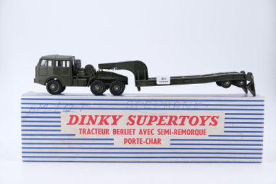 a toy truck with a trailer attached to the back of it