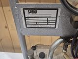 a picture of a water heater with a gauge on it