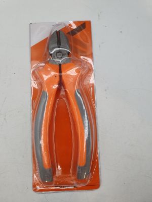 a pair of pliers in a package on a table